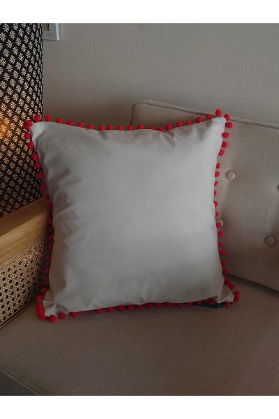 White linen with red pom poms